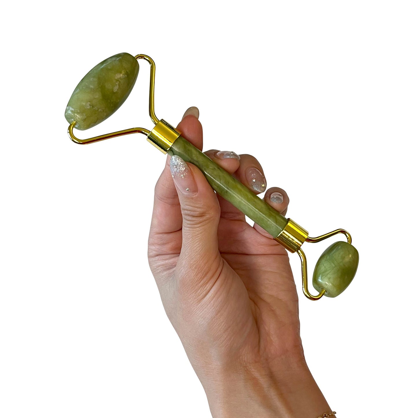 AQUELLE Jade Roller – hochwertiger grüner Gesichtsmassager aus echter Jade, gehalten in einer Hand vor weißem Hintergrund für minimalistischen Look und natürliche Eleganz.